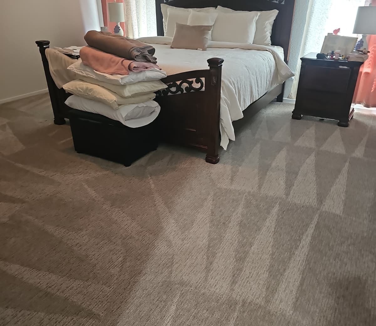 Master bedroom carpet steam cleaning with linens set aside