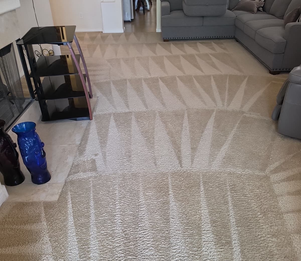 Sunburst carpet cleaning pattern in a living room