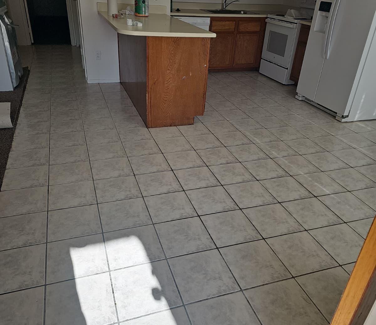 Clean kitchen tile floor after cleaning service