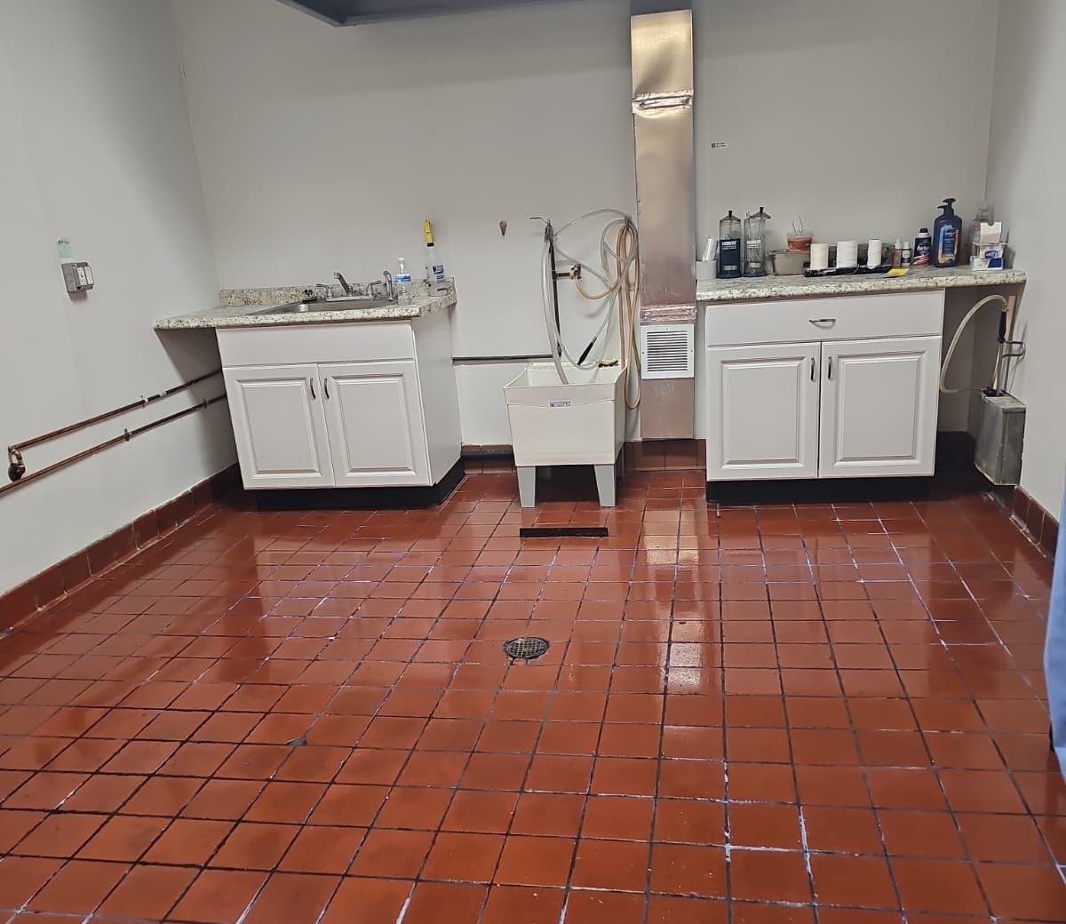 Same commercial kitchen tile floor spotless after cleaning